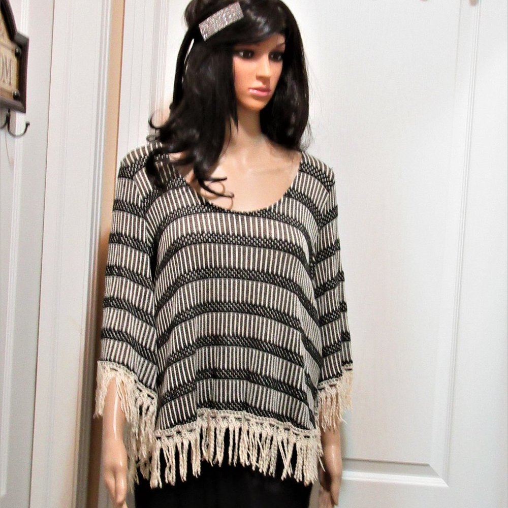 New Very unique top with fringes